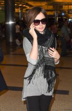 LILY COLLINS at LAX Airport in Los Angeles 0703