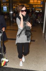 LILY COLLINS at LAX Airport in Los Angeles 0703