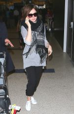 LILY COLLINS at LAX Airport in Los Angeles 0703