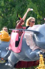 LILY COLLINS Celebrates Her 26th Birthday at Disneyland