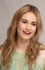 LILY JAMES at Cinderella Press Conference in Beverly Hills