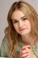 LILY JAMES at Cinderella Press Conference in Beverly Hills
