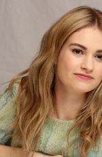 LILY JAMES at Cinderella Press Conference in Beverly Hills