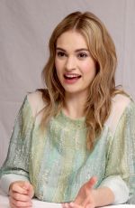 LILY JAMES at Cinderella Press Conference in Beverly Hills