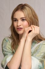 LILY JAMES at Cinderella Press Conference in Beverly Hills