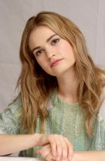 LILY JAMES at Cinderella Press Conference in Beverly Hills