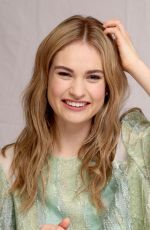 LILY JAMES at Cinderella Press Conference in Beverly Hills