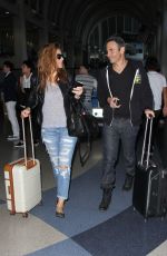MARIA MENOUNOS in Ripped Jeans at LAX Airport 2303