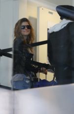 MARIA MENOUNOS in Ripped Jeans at LAX Airport 2303