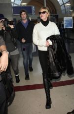 MELANIE GRIFFITH Arrives at LAX Airport in Los Angeles