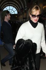 MELANIE GRIFFITH Arrives at LAX Airport in Los Angeles