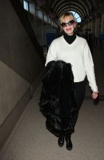 MELANIE GRIFFITH Arrives at LAX Airport in Los Angeles