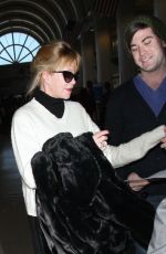 MELANIE GRIFFITH Arrives at LAX Airport in Los Angeles