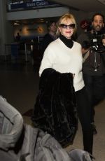 MELANIE GRIFFITH Arrives at LAX Airport in Los Angeles