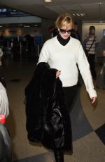 MELANIE GRIFFITH Arrives at LAX Airport in Los Angeles