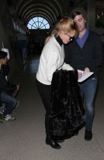 MELANIE GRIFFITH Arrives at LAX Airport in Los Angeles