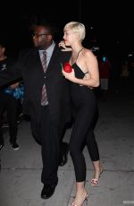MILEY CYRUS Arrives at The Laugh Factory in West Hollywood