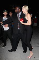 MILEY CYRUS Arrives at The Laugh Factory in West Hollywood