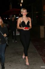 MILEY CYRUS Arrives at The Laugh Factory in West Hollywood