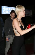 MILEY CYRUS Arrives at The Laugh Factory in West Hollywood