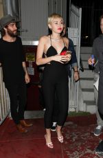 MILEY CYRUS Arrives at The Laugh Factory in West Hollywood