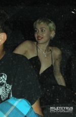 MILEY CYRUS Arrives at The Laugh Factory in West Hollywood