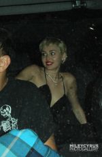 MILEY CYRUS Arrives at The Laugh Factory in West Hollywood