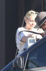 MILEY CYRUS at Unbreakable Tattoo in Studio City
