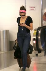 NINA DOBREV at LAX Airport in Los Angeles