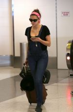 NINA DOBREV at LAX Airport in Los Angeles