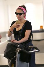 NINA DOBREV at LAX Airport in Los Angeles