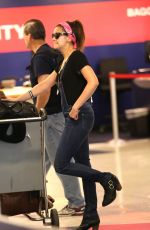 NINA DOBREV at LAX Airport in Los Angeles