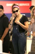 NINA DOBREV at LAX Airport in Los Angeles
