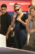 NINA DOBREV at LAX Airport in Los Angeles