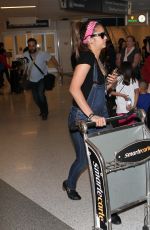 NINA DOBREV at LAX Airport in Los Angeles