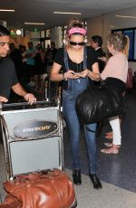 NINA DOBREV at LAX Airport in Los Angeles