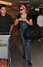 NINA DOBREV at LAX Airport in Los Angeles