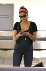 NINA DOBREV at LAX Airport in Los Angeles
