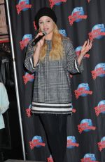 OLIVIA HOLT at Planet Hollywood in Times Square in New York
