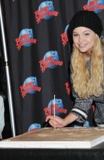 OLIVIA HOLT at Planet Hollywood in Times Square in New York