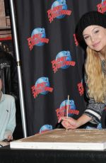 OLIVIA HOLT at Planet Hollywood in Times Square in New York