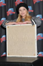 OLIVIA HOLT at Planet Hollywood in Times Square in New York