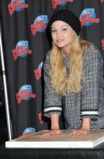OLIVIA HOLT at Planet Hollywood in Times Square in New York