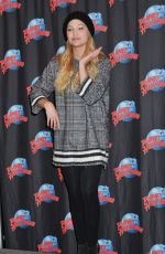 OLIVIA HOLT at Planet Hollywood in Times Square in New York