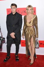 PAMELA ANDERSON at The Gunman Premiere in Los Angeles