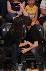 PHOEBE TONKIN and and Paul Wesley at LA Lakers Game