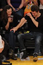 PHOEBE TONKIN and and Paul Wesley at LA Lakers Game