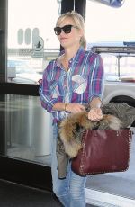 REESE WITHERSPOON in Jeans at Los Angeles International Airport 0903