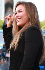 RONDA ROUSEY on the Set of Extra in Los Angeles