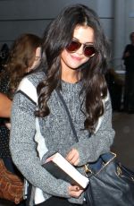 SELENA GOMEZ Arrives at Los Angeles International Airport 1203